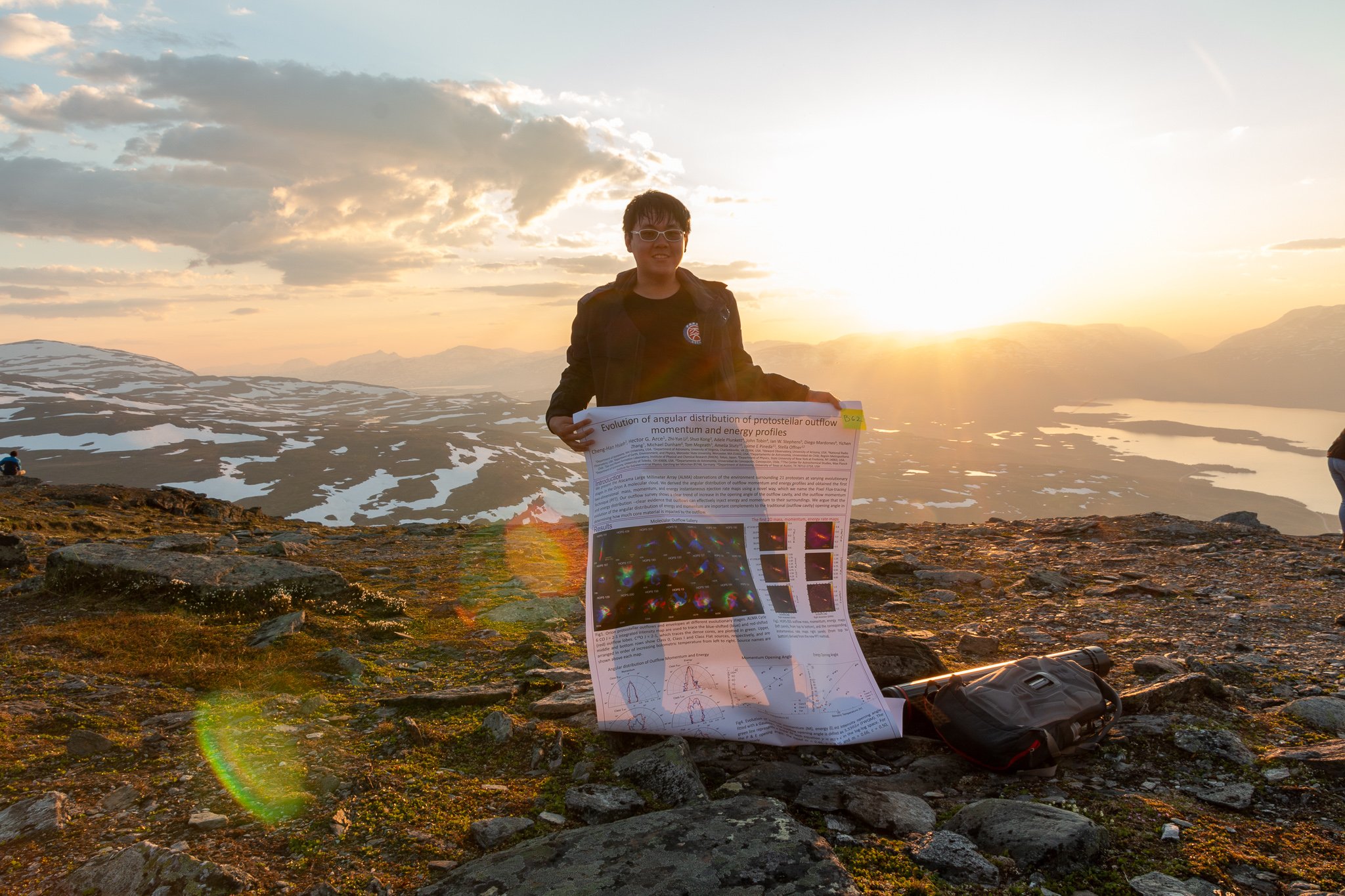 Picture of me and my poster on the top of Mt. Nuoljia (1169m) in the Arctic circle, Abisko National Park, Northern Sweden under the Midnight Sun.